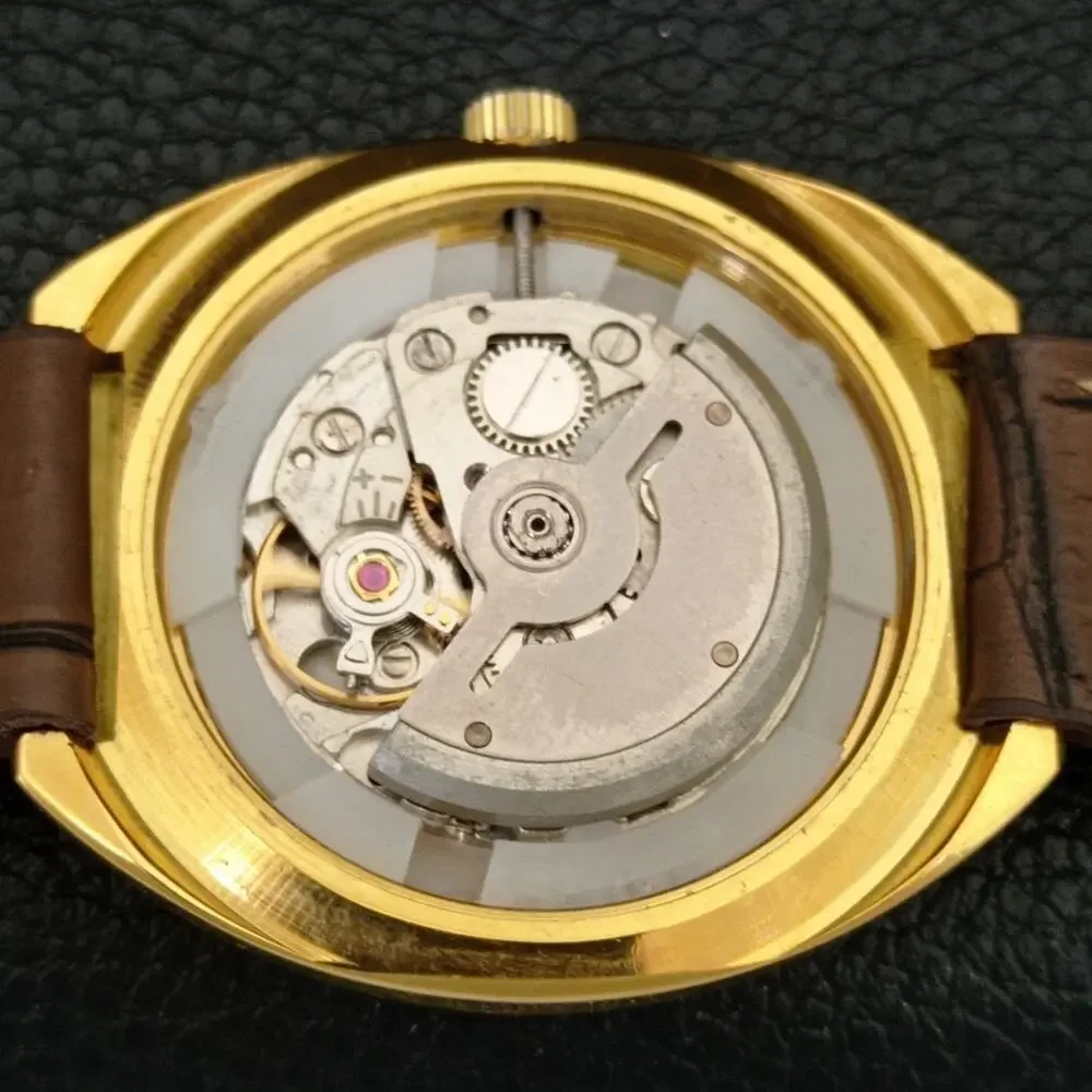 Vintage 1976 HMT Automatic Wound Mens Gold Watch W/daydate & Red accents